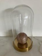 Stolp met kaars, Ophalen