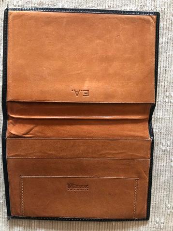 Delvaux portefeuille beschikbaar voor biedingen