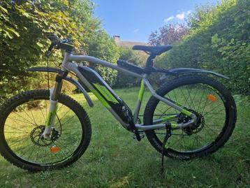 Vtt électrique Rockrider eST500 disponible aux enchères