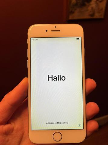 iPhone 6 blanc 64GB avec câble disponible aux enchères