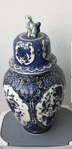 Delfts blauwe vaas van boch, Ophalen