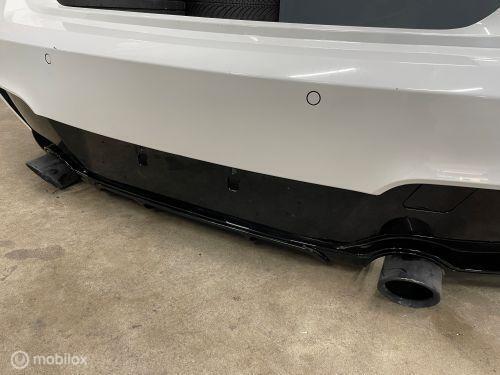M Achterbumper + dubbele einddemper BMW 1-serie F20 ('11->), Auto-onderdelen, Carrosserie, Bumper, BMW, Achter, Gebruikt, Ophalen