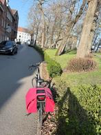 Elektrische damesfiets. Zwartgrijs voorzien van draagtassen., 55 tot 59 cm, Ophalen, Gebruikt, 30 tot 50 km per accu