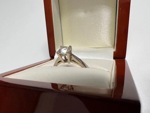 solitaire 18kt witgouden ring met 0.74kt diamant., Bijoux, Sacs & Beauté, Bagues, Comme neuf, Femme, Or, Or, Avec pierre précieuse