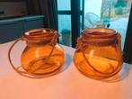 Twee oranjekleurige glazen potten, Tuin en Terras, Ophalen of Verzenden