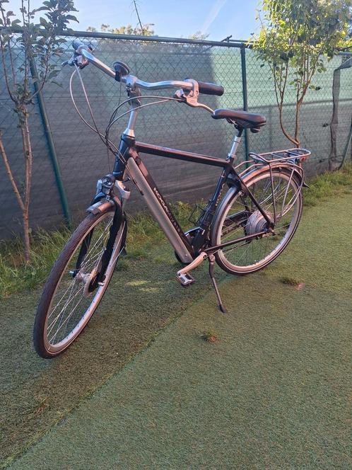 Koga elektrisch herenfiets, Fietsen en Brommers, Elektrische fietsen, Zo goed als nieuw, Ophalen of Verzenden