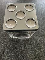 Theelichthouder, Enlèvement