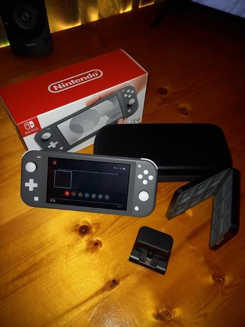 Nintendo Switch Lite, Games en Spelcomputers, Spelcomputers | Nintendo Switch Lite, Zo goed als nieuw, Grijs, Met beschermhoes of tas