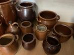 Aardewerken bruine potten, Ophalen