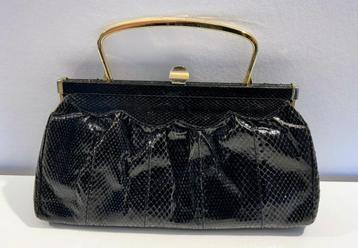 Vintage zwarte clutch beschikbaar voor biedingen