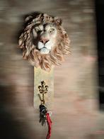 Leeuwenkop  wandhaak, Ophalen