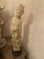 beeldje van een Aziatische vrouw, Ophalen