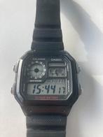 Casio world time uurwerk quartz, Handtassen en Accessoires, Casio, Kunststof, Gebruikt, Polshorloge