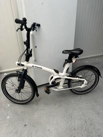 2 vouwfietsen BTWIN met rubberen ketting draaggewicht 110 kg beschikbaar voor biedingen