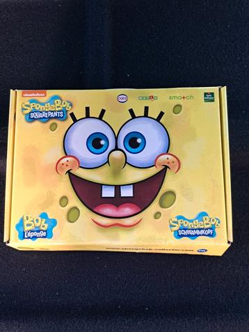 Coffret billes + album spongebob.  Rendez-vous Bruxelles  disponible aux enchères