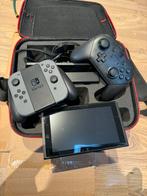 Nintendo switch + controller + travelcase + spelletjes, Comme neuf, Enlèvement ou Envoi