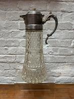 2 glazen karaffen met verzilverde schenkkop, Enlèvement