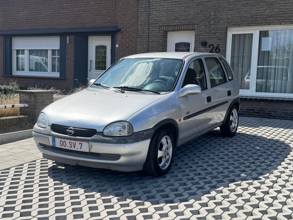 Opel Corsa 1.2 benzine 1ste eigenaar gekeurd voor verkoop, Auto's, 4 cilinders, 48 kW, Electronic Stability Program (ESP), 5 deurs