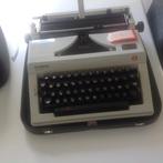 Machine à écrire Olympia (Regina de Luxe) dans un étui porta, Enlèvement