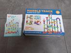 Knikkerbaan (marble track), Ophalen, Puzzelen
