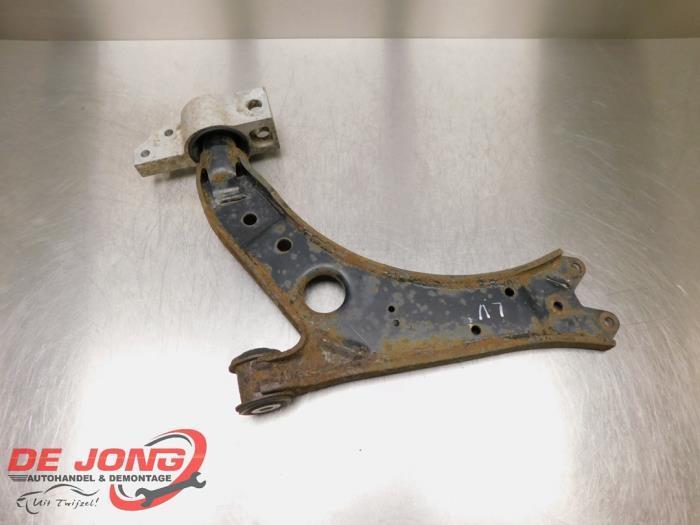 Draagarm links-voor van een Volkswagen Caddy, Auto-onderdelen, Ophanging en Onderstel, Volkswagen, Gebruikt, 3 maanden garantie