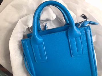 Nieuwe blauwe handtas met schouderriem 