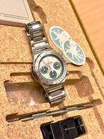 Laventure Automobile 100% Suisse Rolex Patek Omega Audemars, Enlèvement, Omega, Acier, Acier