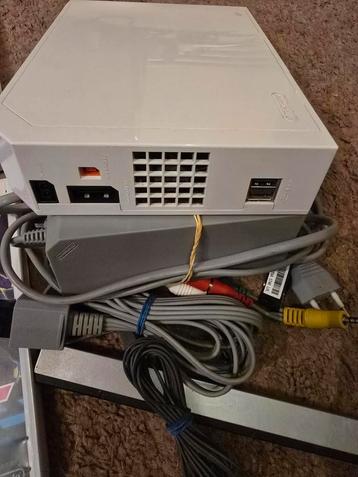 WII-console + 10 spellen beschikbaar voor biedingen