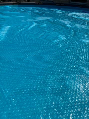 Zwembad met zandfilter en warmtepomp beschikbaar voor biedingen