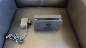 Nintento Switch dock + stroomadapter beschikbaar voor biedingen