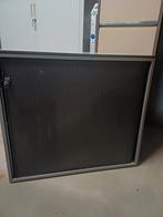 Roldeurkast archiefkast, Ophalen