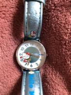 Hello Kitty glimmend lichtblauw horloge, Handtassen en Accessoires, Ophalen of Verzenden, Gebruikt, Blauw, Meisje