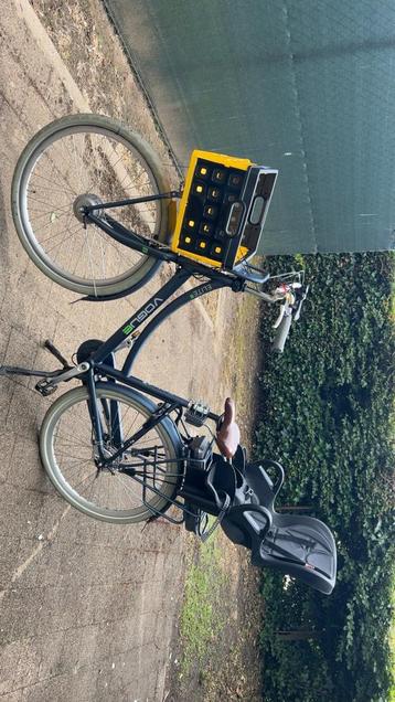 Elektrische fiets + fietskar met zitje beschikbaar voor biedingen