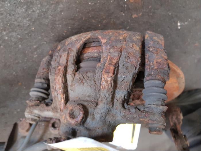 Remklauw (Tang) links-voor van een Opel Corsa, Auto-onderdelen, Remmen en Aandrijving, Opel, Gebruikt, 3 maanden garantie, Ophalen of Verzenden