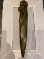 Sculpture en bronze, Ophalen