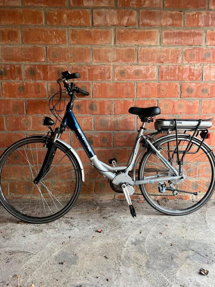 Nieuwe elektrische fiets minerva met middenmotor, Fietsen en Brommers, Elektrische fietsen, Zo goed als nieuw, Ophalen