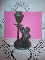 Beeldje in semak of koper, Ophalen