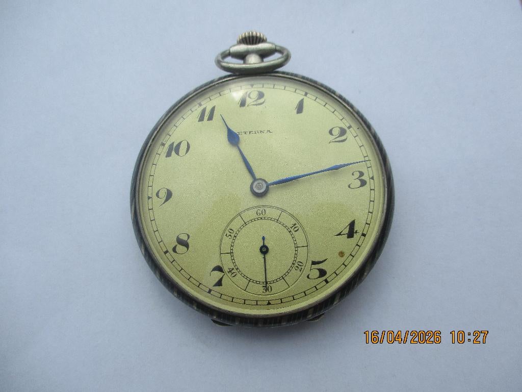 montre gousset eterna argent et or, Enlèvement, Or