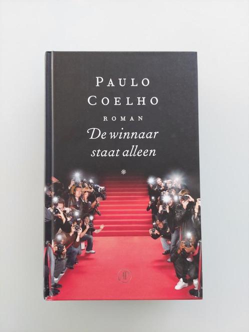 De winnaar staat alleen - Paulo Coelho, Boeken, Romans, Zo goed als nieuw, Ophalen of Verzenden