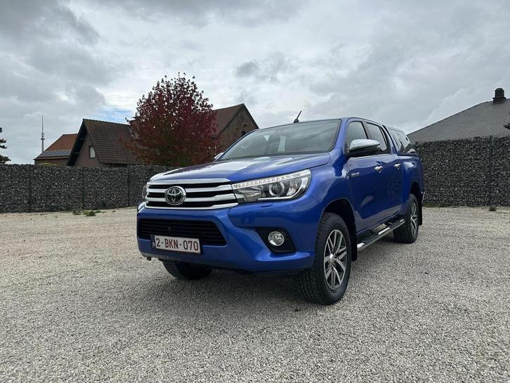 Toyota Hilux 2.4 D-4D Double Cab Aut Comfort, Auto's, Toyota, Bedrijf, Te koop, Hilux, 4x4, Airconditioning, Centrale vergrendeling