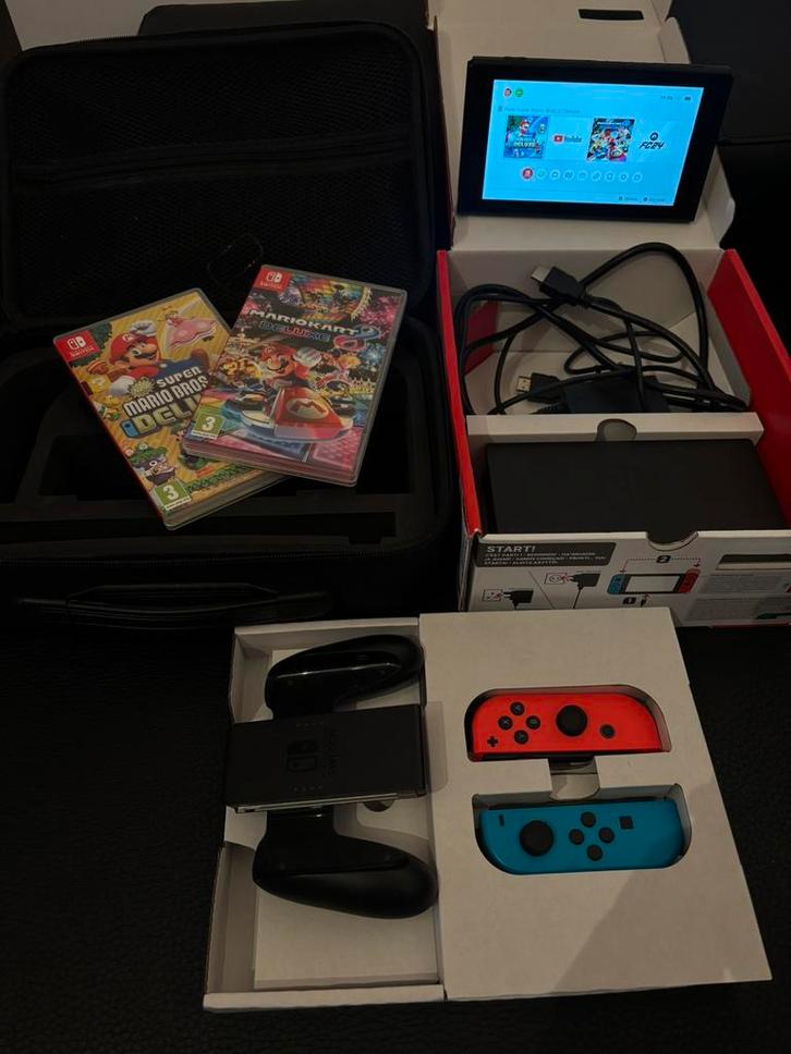 Nintendo Switch + 2 Mario-games + hoesje -Uitstekende staat!, Games en Spelcomputers, Spelcomputers | Nintendo Switch, Zo goed als nieuw
