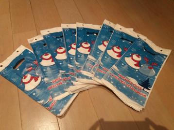 Mooie plastic zakjes 'prettige feestdagen / joyeuses fêtes' beschikbaar voor biedingen
