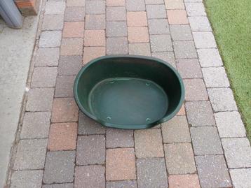 Mand voor kleine hond (harde plastiek) beschikbaar voor biedingen