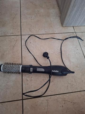 Brosse soufflante Babyliss. 