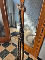 Girafe en bois, Ophalen