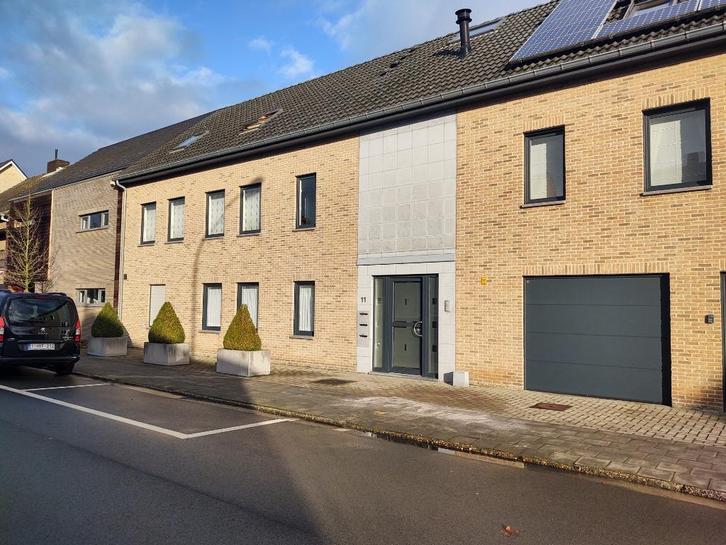 Gelijkvloers appartement met tuin, overdekt terras & garage, Immo, Appartementen en Studio's te huur, Provincie Limburg, 50 m² of meer