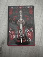 Boek: The shadows between us, Ophalen, Nieuw