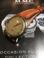 Montre Omega ancienne jumbo, Handtassen en Accessoires, Horloges | Antiek, Goud, Omega, Met bandje, Ophalen of Verzenden