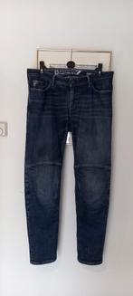 Alpinestars jeans-moterbroek, Ophalen