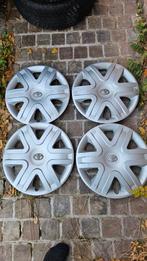 4 enjoliveurs Toyota 16", Autos : Divers, Enjoliveurs, Enlèvement